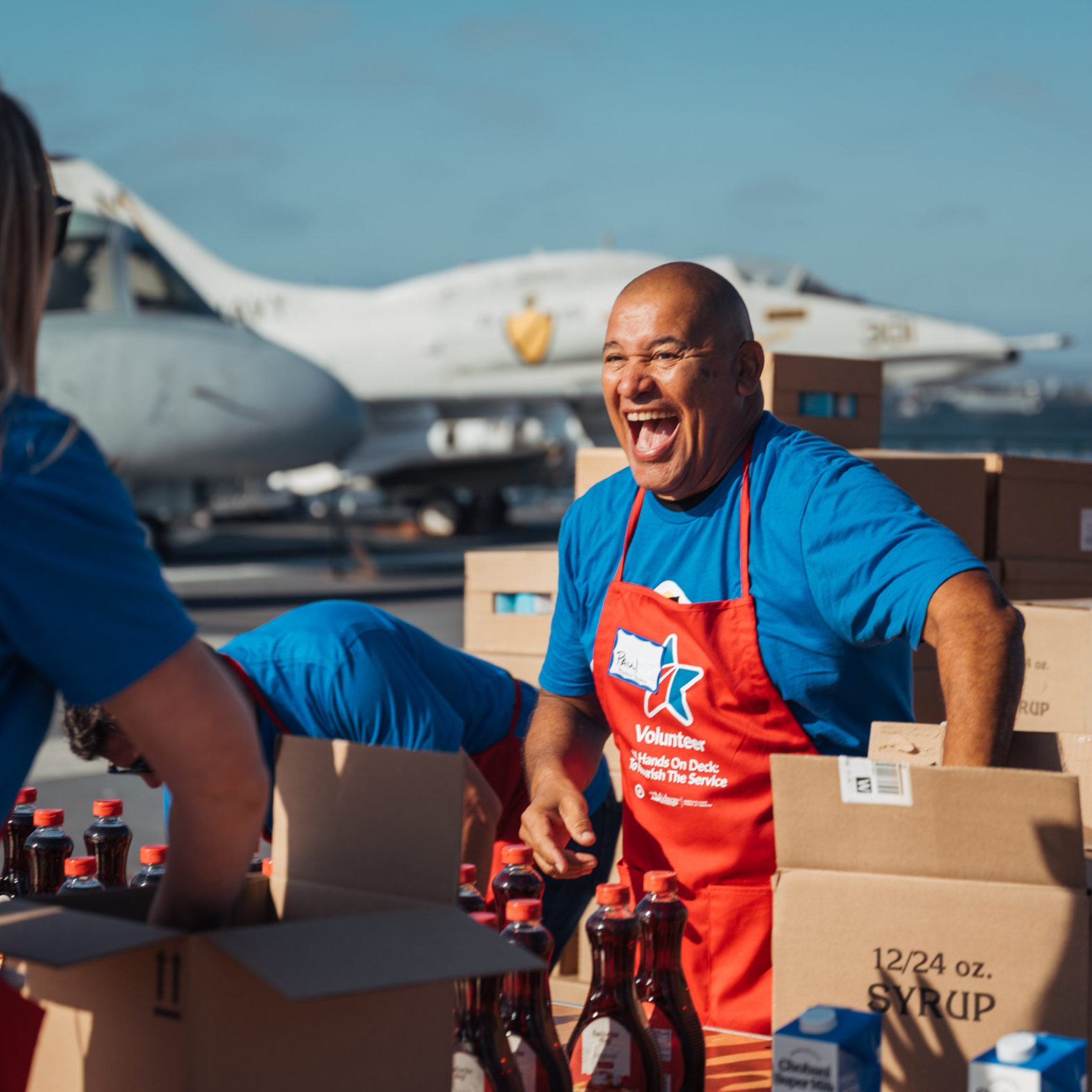 Campaign,  Partner,  Blue Star Welcome Week,  Brand Parternships,  Brand Partner,  Military Family,  Target,  Adult,  Box,  Face,  Female,  Happy,  Head,  Laughing,  Male,  Man,  Person
All Hands On Deck: To Nourish the Service volunteer activation with Target
